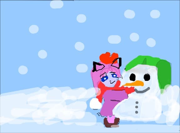 o pisica fata facand un om de zapada